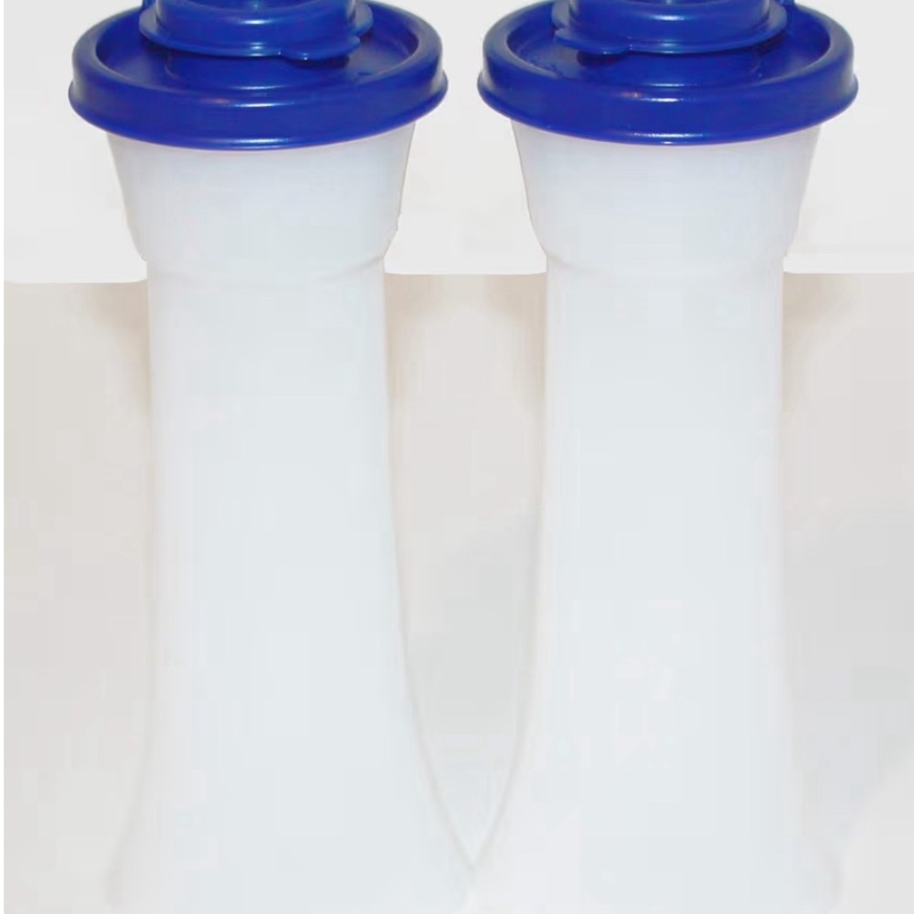 Tupperware  Large Hourglass Salt and Pepper Shakers.